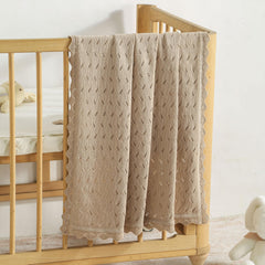 Loyfoky blanket in neutral khaki color fits any nursery theme.