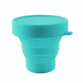 Lucky Clover collapsible cup folded for ultra-compact travel convenience.
