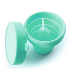 Lucky Clover collapsible cup used for sterilizing and storing Diva Cup.