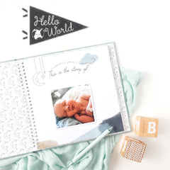 Lucy Darling Celestial Skies milestones spread helps capture first smiles and steps.