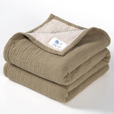 Lulu Moon Muslin Baby Blanket Olive closeup showing soft breathable texture for gentle comfort
