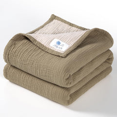 Lulu Moon Muslin Baby Blanket Olive closeup showing soft breathable texture for gentle comfort