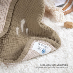 Lulu Moon Muslin Baby Blanket Olive two-tone design enhances nursery decor