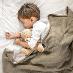 Lulu Moon Muslin Baby Blanket Olive folded neatly for easy storage and travel