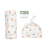 Lulujo birth-announcement-hat-swaddle-set shows a keepsake photo prop with breathable bamboo muslin.
