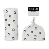 Lulujo Hello World set on newborn hat and swaddle for easy portraits