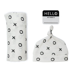 Lulujo Hello World set on newborn hat and swaddle for easy portraits