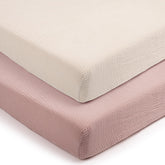 Lulumoon soft muslin close-up on fitted pack and play sheet for gentle baby skin.