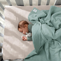 Lulumoon sage muslin baby blanket ideal for travel and stroller use.
