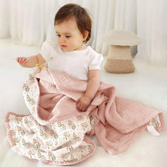 Lulumoon Muslin Blanket 47x47 folded for compact nursery storage.