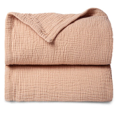 Lulumoon pink muslin blanket front view shows soft four-layer cotton texture for baby comfort.