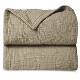 Lulumoon olive muslin blanket folded for gentle skin contact