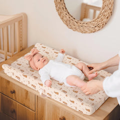 Lulumoon changing pad cover with bunny print enhances nursery decor while protecting pads.