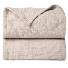 Lulumoon ivory muslin quilt blanket close-up of soft cotton fabric for gentle skin
