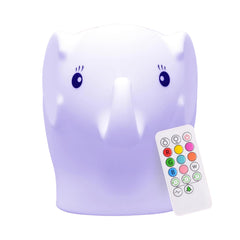 Lumipets Eggbert elephant night light glows softly on a kid's nightstand