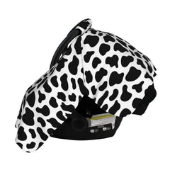 Lunepon cow-print nursing cover provides privacy during feeding.