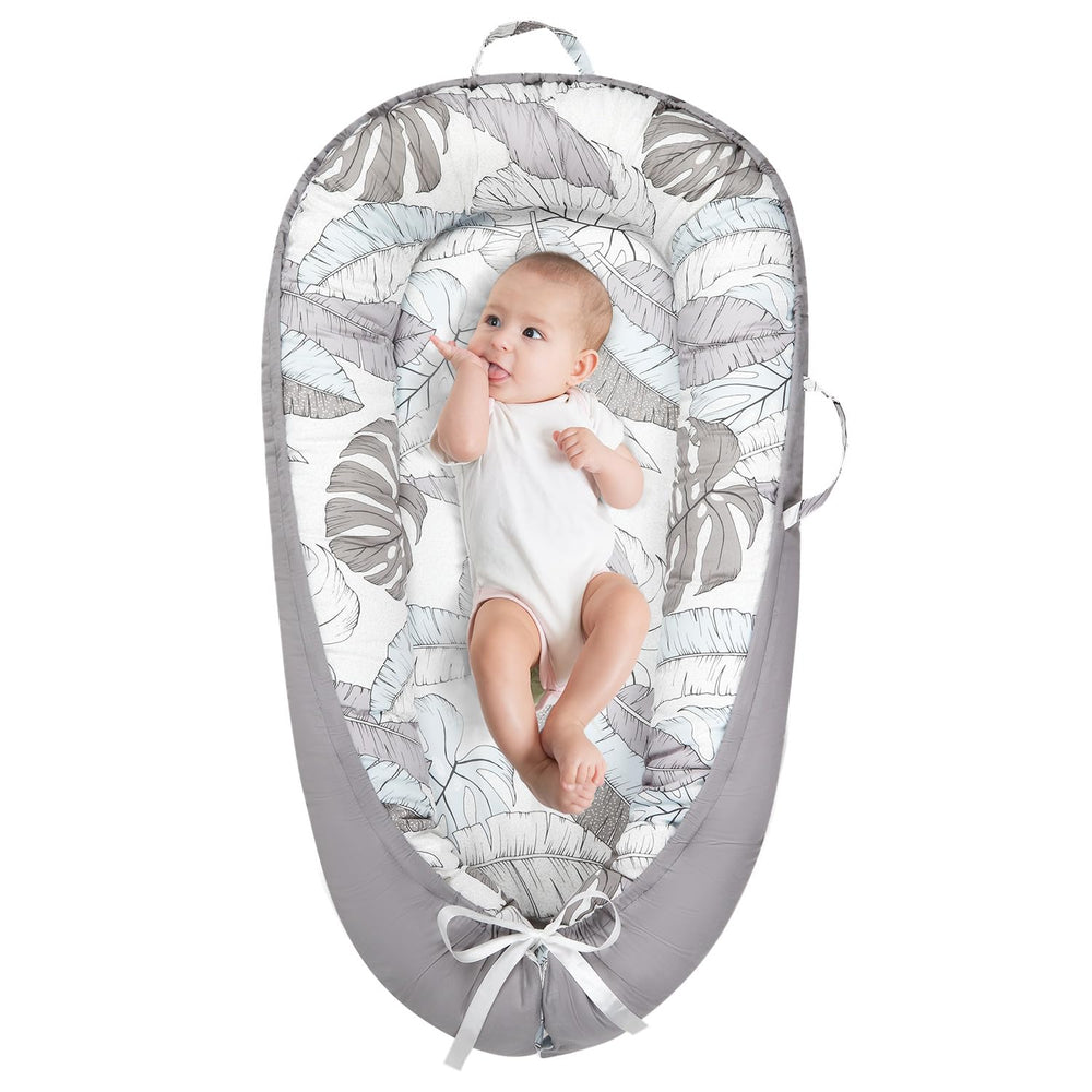 Lurui Baby Lounger with reversible cover patterns for quick style changes and comfort.