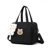 Lushandy diaper bag tote front pocket for quick access on outings.