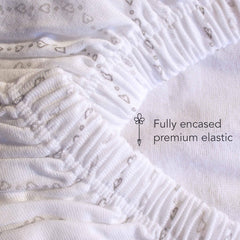 Luvberries Guava Lotus 24x42 crib sheet covers portable crib mattresses.