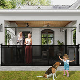 Luvcoo retractable gate extended over stairs for wide coverage and kid/pet safety.