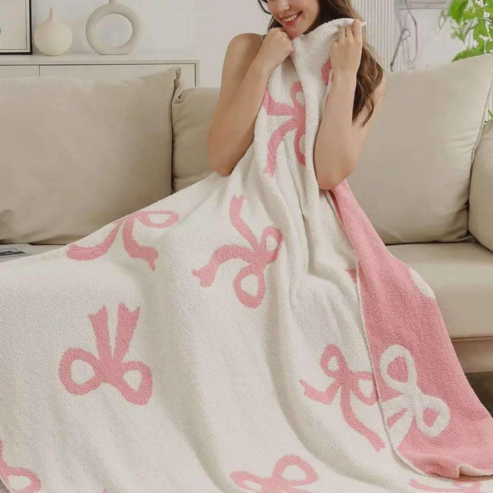 Luxape Bow Blanket Pink Bows, cozy warmth for infants during nap time.