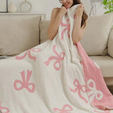 Luxape Bow Blanket Pink Bows, cozy warmth for infants during nap time.