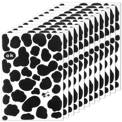 LXUEJIE cow print stickers sheet close up showing durable vinyl for long lasting wall decor