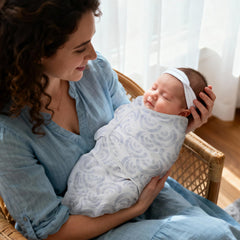 LYRICHOM BABY cloud-print swaddle sacks aid soothing naps for young babies.