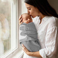 LYRICHOM BABY swaddle sacks in swaddle pose demonstrate snug womb-like feel