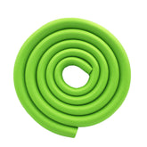 M2cbridge U shape edge protector on a glass table corner for child safety.