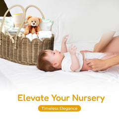 Mae Bird rattan diaper caddy in use with diapers, wipes, and pacifiers for easy reach.