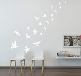 MAFENT white birds wall decal on nursery wall brightens space and invites playful learning.