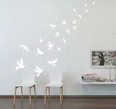 MAFENT white birds wall decal on nursery wall brightens space and invites playful learning.