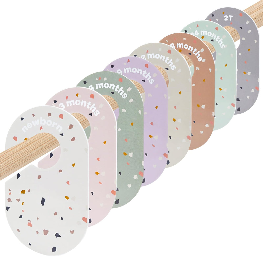 MAIDIWUDI 8Pack newborn divider on a closet rod helps organize tiny outfits efficiently.