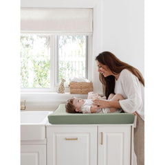 MairMore changing pad cover with stretch band design for secure, easy fitting.