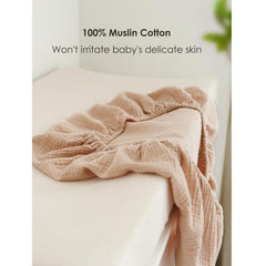 MairMore changing pad cover with stretchy band demonstrates secure, easy fit.