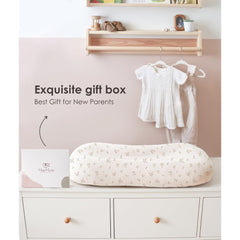MairMore muslin baby lounger cover pink blossom folded, secure fit and easy cleanup.