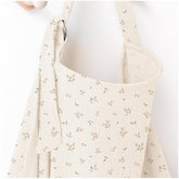 MairMore arch-neckline muslin nursing cover offers breathable privacy during feeding.