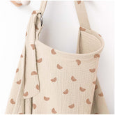 MairMore arch-neckline muslin nursing cover with airflow and eye contact