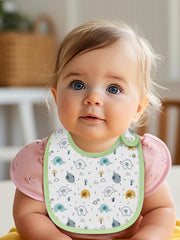 Maiwa teething and drool bib keeps clothes clean during meals.