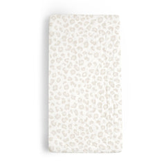 Makemake Organics changing pad cover in wild leopard print for on-the-go diaper changes.