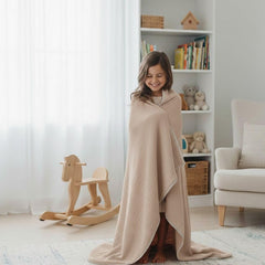 MakeMake Organics muslin blanket folded in taupe color for elegant nursery styling.