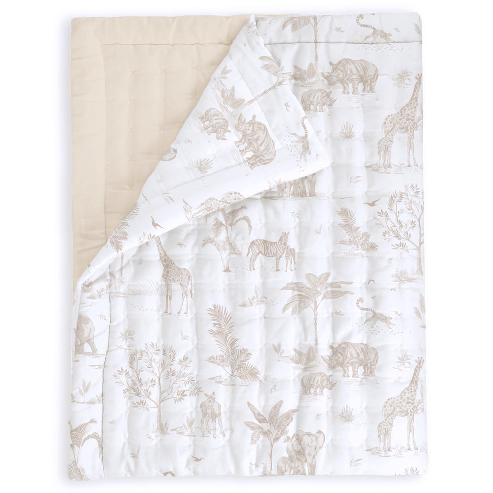 MakeMake Organics toddler comforter safari print offers cozy warmth for naps and playtime.