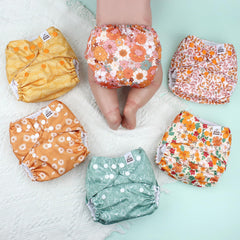 Mama Koala 3.0 pocket diaper uses a waterproof TPU cover to keep baby dry