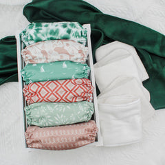 Six-layer natural inserts for versatile absorbency in Mama Koala 3.0 system.