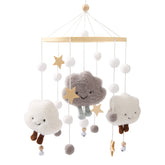 Mamimami Home clouds mobile on wooden hoop promotes calm visual stimulation for soothing babies.