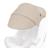 Manito sun shade extender on car seat offers UV protection and cooling shade.