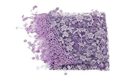 Matissa newborn lace tassels wrap in purple used as a chic photography prop and cozy swaddle