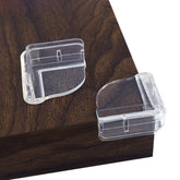 Matyz 16-pack large clear corner protectors on a table edge for transparent safety.