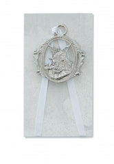 McVan Guardian Angel crib medal with white ribbon for nursery decor and a sentimental keepsake.